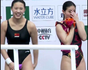 A uber-cute japanese swimmer in a g-string bathing suit