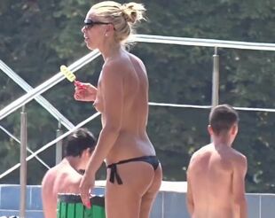 Red-hot Swimsuit Stunners Tanning At The Pool
